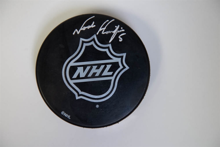  Noah Hanifin Autographed NHL Hockey Puck - UDA