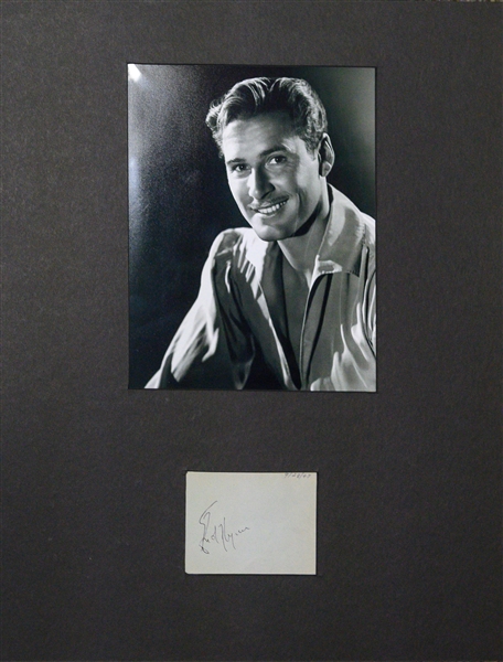 Actor Errol Flynn (Best Known for 1938 Robin Hood Movie) Signed Cut (Dated 9/28/1947) Matted with His Photo (JSA Auction Letter)