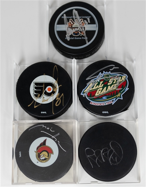Hockey Autograph Lot (6) Pucks (w. Manon Rheaume, Marian Hossa, Joe Sakic, Eric Dejardins, Rob Blake, Olaf Kolzig) & Manon Rheaume Signed Card - JSA Auction Letter