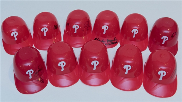 Lot of 11 Philadelphia Phillies Signed Mini Batting Helmets w. Charlie Manuel