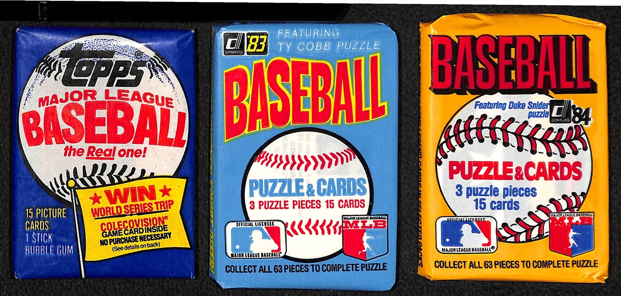 Lot of (7) Different unopened 1983 and 1984 Baseball Wax Packs (Topps, Fleer, Donruss)