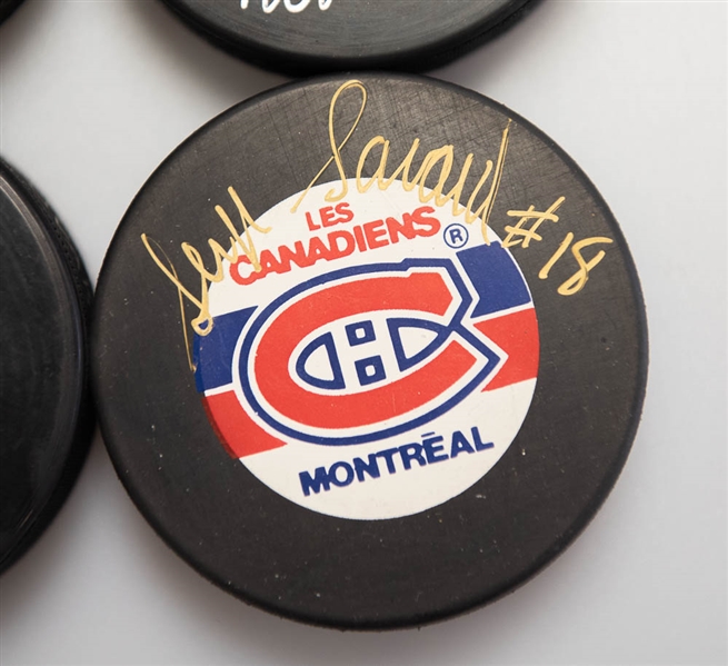 Lot of (4) Signed Montreal Canadiens Hockey Pucks (Serge Savard, Denis Savard, Guy Lapointe, Ken Reardon)  - JSA Auction Letter