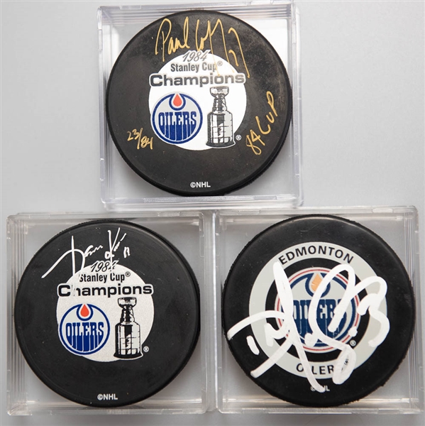 Lot of (3) Signed Edmonton Oilers Hockey Pucks (Paul Coffey, Jari Kurri, and Dan McGillis)  - JSA Auction Letter