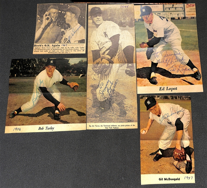Lot of (26) Signed NY Yankees Clippings Inc. (2) Frank Crosetti, (3) Charley Keller, (3) Joe Collins, Tommy Byrnes, T. Henrich, (3) Don Larsen, (2) Elston Howard - JSA Auction Letter