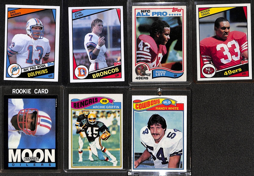 Lot of (7) Football Rookie Cards - Marino, Elway, Lott, Craig, Moon, Griffin, and Randy White!