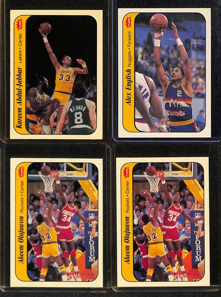 Lot of (15) Fleer Basketball Stickers - (4) 1986-87 (w. Jabbar, 2 Olajuwon), (10) 1987-88 (Bird, Magic, Barkley, +), (1) 1988-89 (I. Thomas)