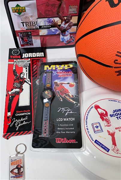 Large Lot of Michael Jordan Collectibles - (2) Hang Time Gum Packs, Cologne, Farley's Gummies Box (Compressed), (7) Jordan or Bulls Watches (3 Sealed in Packages), Boy Scout Frisbee, Wheaties...