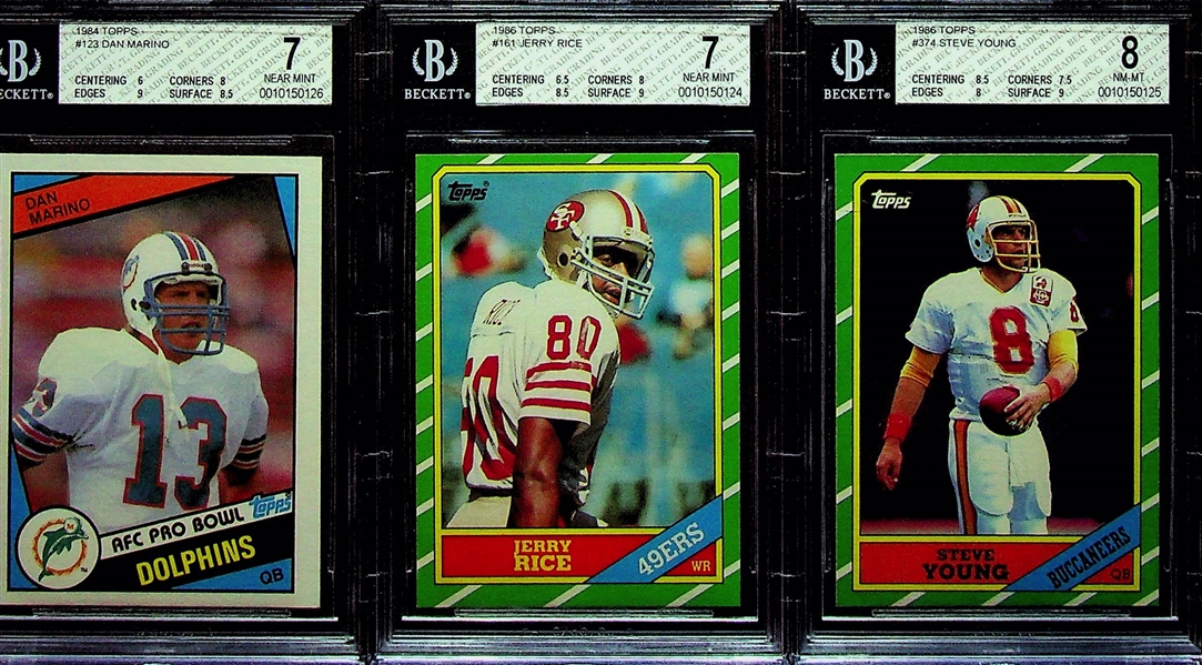 1984 Dan Marino Rookie BGS 7, 1986 Jerry Rice Rookie BGS 7, and 1986 Steve Young Rookie BGS 8