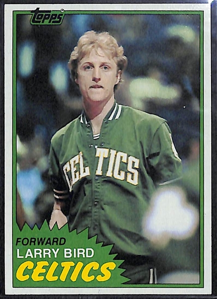 1981 Topps Larry Bird (#4) and 1985 Star Julius Erving (#204)
