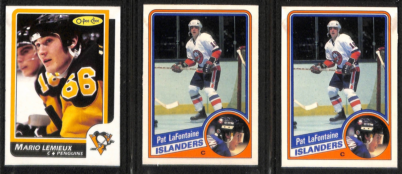 (6) OPC Hockey Cards - 1984 Yzerman Rookie #67, 1987 Luc Robitaille RC #42, 1988 Brett Hull RC #66, 1986 Mario Lemieux #122, (2) 1984 Pat LaFontaine RCs #129