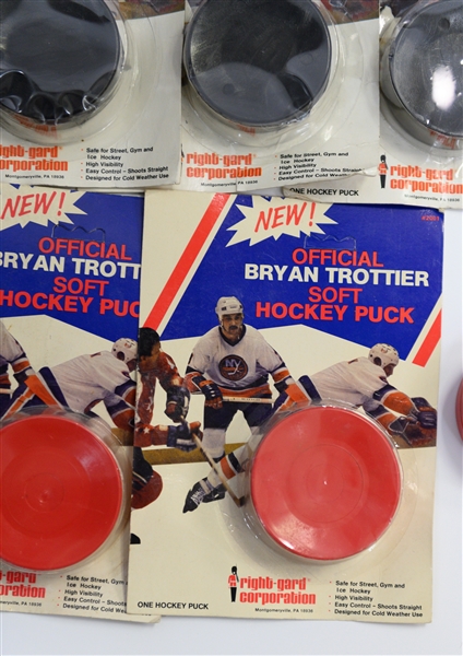 Lot of 12 Official Bryan Trottier Hockey Pucks (New York Islanders) In Original Factory Packaging
