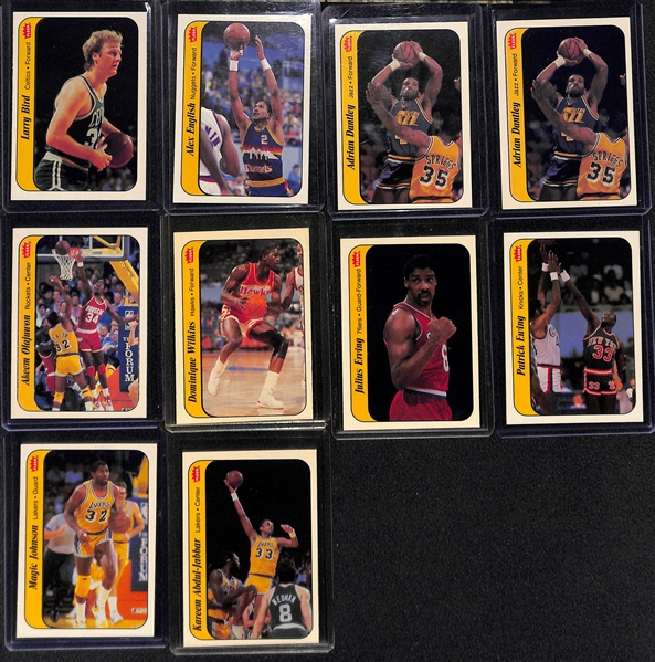 Lot of (10) 1986 Fleer Basketball Stickers Inc. Bird, Ewing, Jabbar, Magic, Olajuwon, Wilkins and More