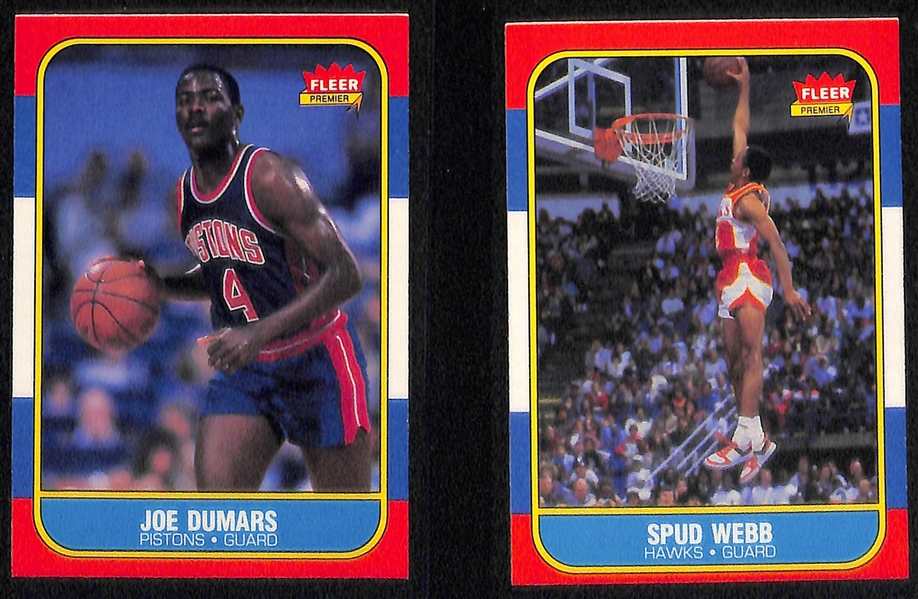 Lot of (4) 1986 Fleer Basketball Rookies Inc. Dominique Wilkins, Joe Dumars and Spud Webb