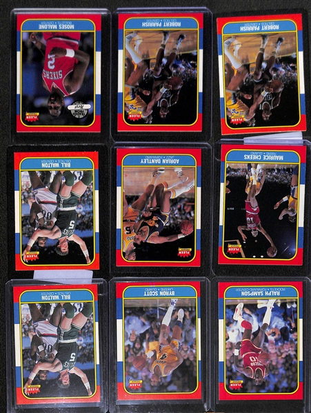 Lot of (75+) 1986-87 Fleer Basketball Cards w. Patrick Ewing, Isiah Thomas and (7) Stickers w. Wilkins, Olajuwon, Abdul-Jabbar and More!