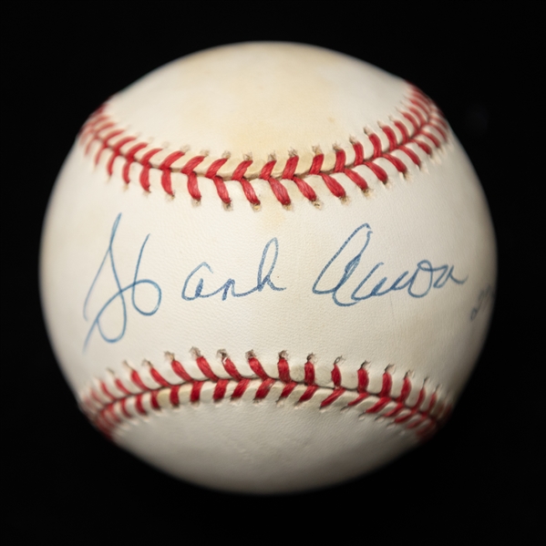 Lot of (2) Hank Aaron Autographed Baseballs w. 1 Official National League and 1 Jackie Robinson 50th Anniversary Ball #d 274/1947 (JSA Auction Letter)