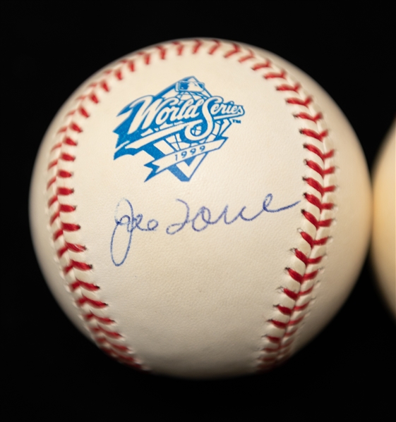 Lot of (2) World Series Autographed Baseballs w. Chipper Jones and Joe Torre (JSA Auction Letter)
