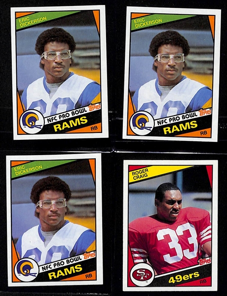 Lot of (7) 1980s Topps Football Rookies w. Marino, Elway, Lott, Dickerson and Craig