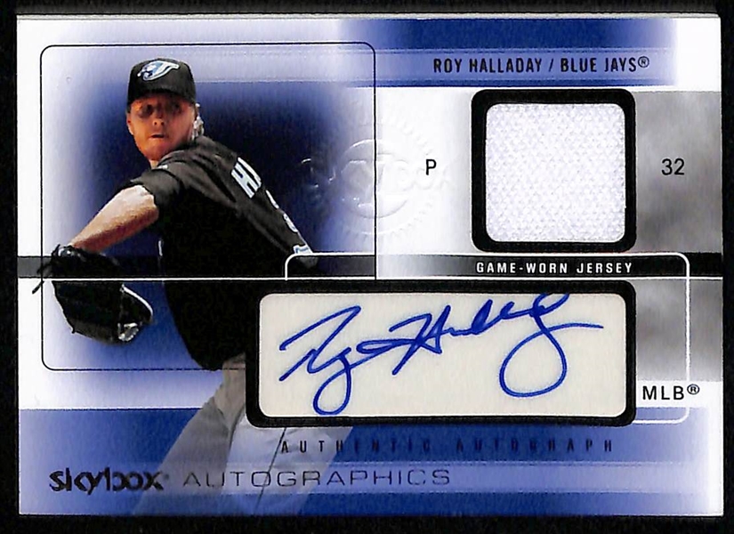 2004 Fleer Authentix & 2005 Skybox Autographics Roy Halladay Autographed Baseball Cards Both #d /75