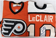 Lot of (2) Autographed Flyers Jerseys w. John LeClair and Bernie Parent (JSA Auction Letter)