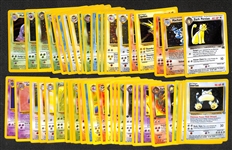 Lot of (50) 1999 & 2000 Pokemon Cards w. (25) Holos Incl. Dark Persian Promo, Machamp, Moltres, Zapdos, Ninetales and Many Others