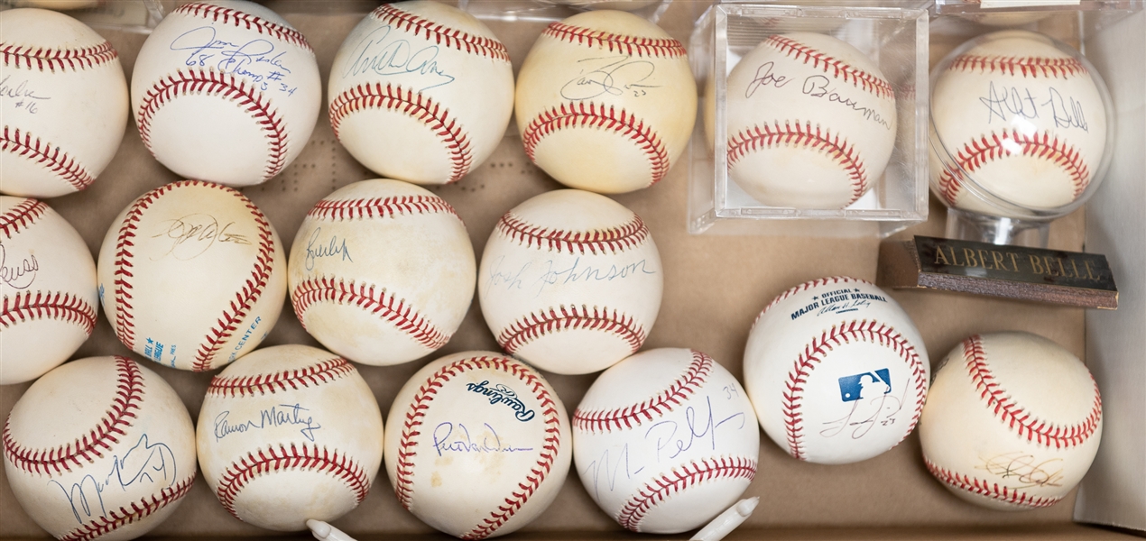 Lot of (21) Autographed Baseballs w. Arthur Ashe, Manny Ramirez, Maury Wills, Zack Greinke, Bobby Cox, and Others (JSA Auction Letter)