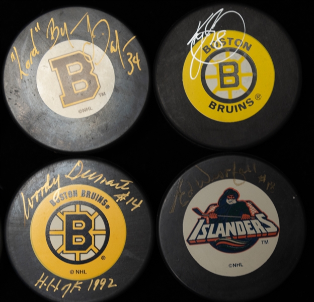 Lot of (6) Autographed Hockey Pucks of Boston Bruin Players w. Esposito, Dumart, Westfall, Murphy, Dafoe, and Crowder (JSA Auction Letter) 