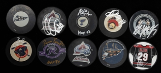 Lot of (10) Autographed Hockey Pucks w. (2) Yagr, Fuhr, Parent, Bob Clark and Others (JSA Auction Letter)