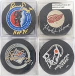 Lot of 4 Signed Hockey Pucks (Eric Lindros, 2 Bernie Parent, & Mark Howe) - JSA Auction Letter