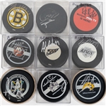 Lot of 9 Signed Hockey Pucks (Mike Bossy, Ray Bourque, Adam Oates, Rob Blake, Mike Knuble, +4) - JSA Auction Letter