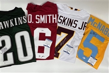 Lot of (4) Autographed Football Jerseys Inc. Dwayne Haskins, Donovan McNabb, and Devonta Smith (All Beckett Authenticated) 
