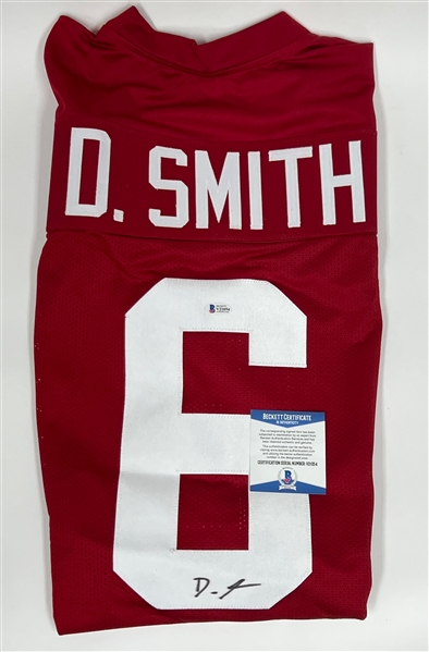 Lot of (4) Autographed Football Jerseys Inc. Dwayne Haskins, Donovan McNabb, and Devonta Smith (All Beckett Authenticated) 