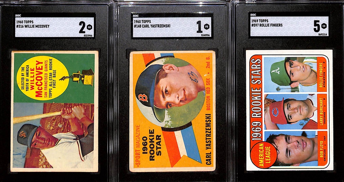 Lot of (3) SGC Graded Topps Rookie Baseball Cards Inc. 1960 Willie McCovey (SGC 2), 1960 Carl Yastrzemski (SGC 1), and 1969 Rollie Fingers (SGC 5)