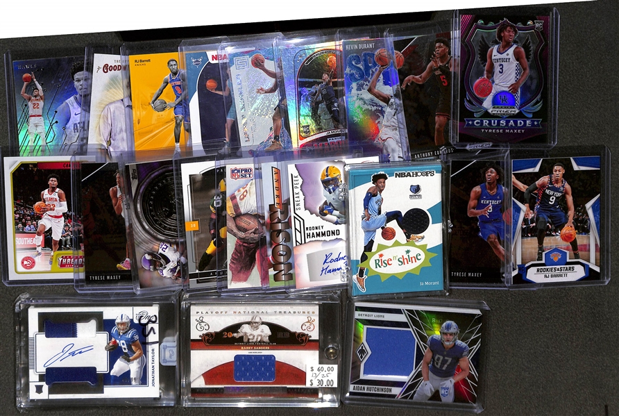 Lot of (22) Football and Basketball Cards including Jonathan Taylor Rookie Patch Autograph (#/99), Barry Sanders Patch (#/25), Ja Morant Rookie Jersey, and more