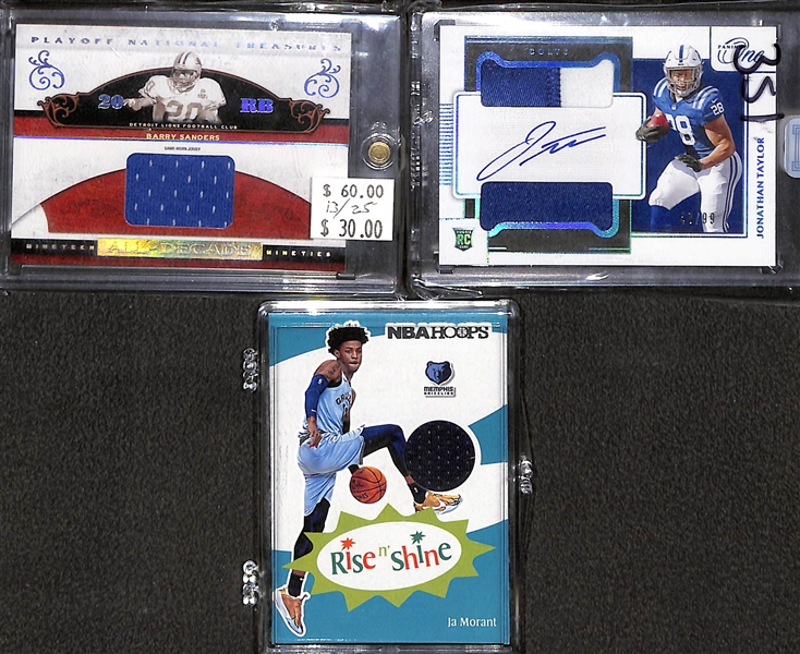 Lot of (22) Football and Basketball Cards including Jonathan Taylor Rookie Patch Autograph (#/99), Barry Sanders Patch (#/25), Ja Morant Rookie Jersey, and more