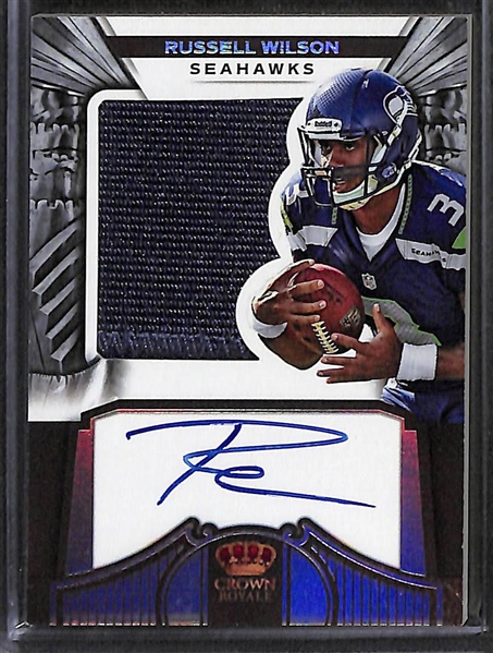 Lot of (2) Rookie Autograph Cards including Russel Wilson Patch (#/149) and Ed Reed