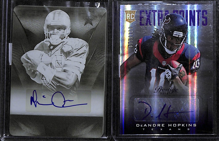 Lot of (31) Football Cards including Michael Irvin Autograph Printing Plate (#/1), DeAndre Hopkins Rookie Autograph (#/100), Stefon Diggs Rookie Patch Autograph Booklet (#/99), and more! 