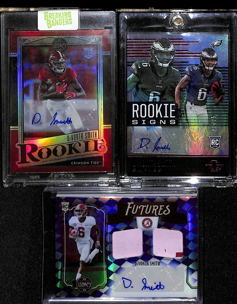 Lot of (24) Devonta Smith Rookie cards w. 2021 Legacy Autograph #d /35, 2021 Illusions Rookie Signs Autograph #d /25 and More