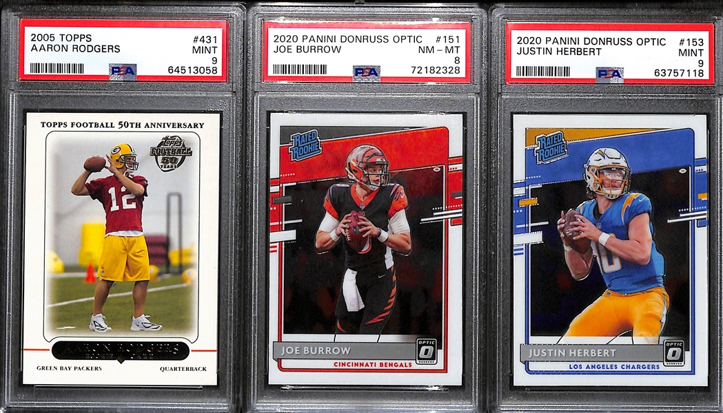 (7) PSA Graded Football Star/HOF Rookies- 2005 Topps Aaron Rodgers (PSA 9), 2020 Optic Joe Burrow (PSA 8), 2020 Optic Justin Herbert (PSA 9), Darrelle Revis (PSA 8), Calvin Johnson (PSA 9), +