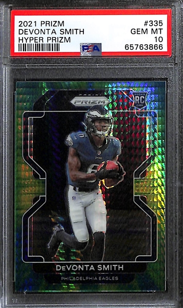 Lot of (3) Young Superstar Wide Receiver Graded Rookie Cards Inc. 2021 Prizm Devonta Smith Hyper (PSA 10) (#/175), 2022 Prizm Christian Watson Variation (SGC 9), 2022 Origins Drake London Blank...