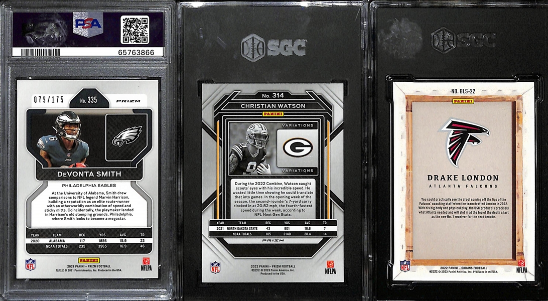 Lot of (3) Young Superstar Wide Receiver Graded Rookie Cards Inc. 2021 Prizm Devonta Smith Hyper (PSA 10) (#/175), 2022 Prizm Christian Watson Variation (SGC 9), 2022 Origins Drake London Blank...