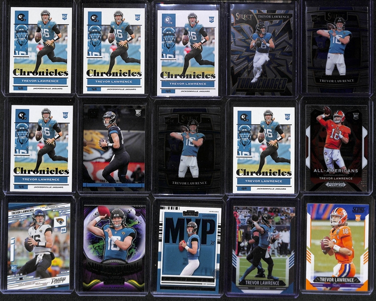 Lot of (34) Trevor Lawrence Rookie Cards inc. Donruss Optic Gifted Rookies, Chronicles Luminance Pink, Chronicles Clear Vision, Chronicles Magnitude, Chronicles Playoff Momentum, Chronicles Orange, +