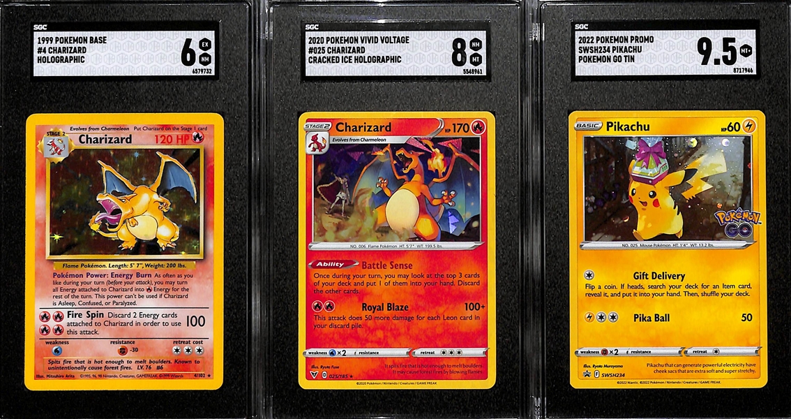 Lot of (3) SGC Graded Pokemon Cards Inc. 1999 Base #4 Charizard Holographic (Graded 6), 2020 Vivid Voltage #025 Charizard Cracked Ice Holographic (Graded 8), 2022 Promo Pikachu Pokemon Go Tin...