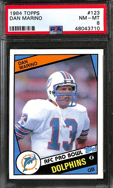 Lot of (3) Early 1980s Topps PSA Graded Hall of Fame Quarterback Rookies inc. 1984 Dan Marino (PSA 8), 1984 john Elway (PSA 8), 1981 Joe Montana (PSA 6)