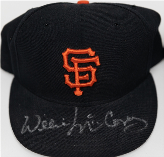 Lot of (2) Autographed Baseball Hats w. Cal Ripken Jr. and Willie McCovey (JSA and Fleer Certs)