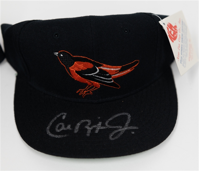 Lot of (2) Autographed Baseball Hats w. Cal Ripken Jr. and Willie McCovey (JSA and Fleer Certs)