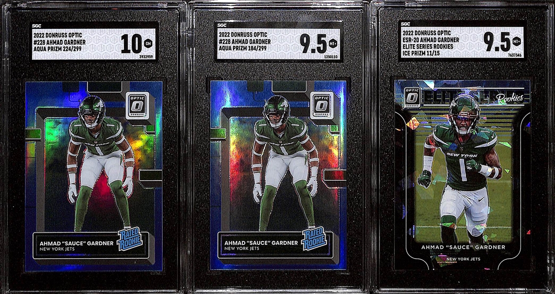 Lot of (3) Donruss Optic Ahmad Sauce Gardner Graded Rookies w. Elite Series Ice Prizm #d /15 SGC 9.5, Aqua Prizm #d /299 SGC 10, More