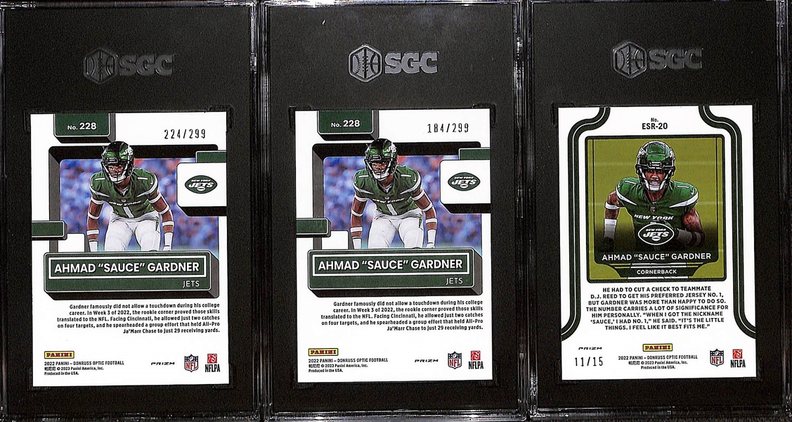 Lot of (3) Donruss Optic Ahmad Sauce Gardner Graded Rookies w. Elite Series Ice Prizm #d /15 SGC 9.5, Aqua Prizm #d /299 SGC 10, More