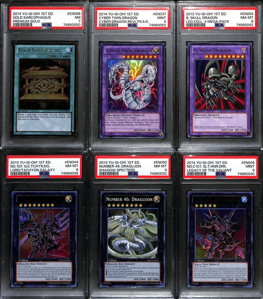 Lot of (6) PSA Graded 2013 and 2014 1st Edition Yu-Gi-Oh! Cards inc. 2014 Gold Sarcophagus Premium Gold (PSA 7), 2014 Cyber Dragon Revolution Cyber Dragon Twin (PSA 9), 2013 Legendary Collection...