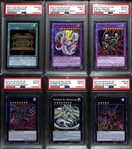 Lot of (6) PSA Graded 2013 and 2014 1st Edition Yu-Gi-Oh! Cards inc. 2014 Gold Sarcophagus Premium Gold (PSA 7), 2014 Cyber Dragon Revolution Cyber Dragon Twin (PSA 9), 2013 Legendary Collection...