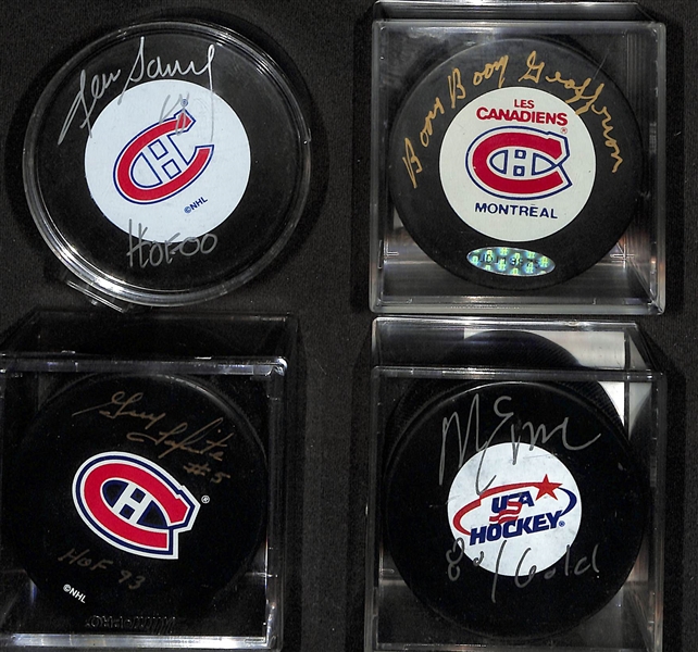 Lot of (4)  Signed Hockey Pucks- Denis Savard (HOF), Boom Boom Bernie Geoffrion (HOF), Guy Lapointe (HOF), Mike Eruzione (JSA COA) - JSA Auction Letter